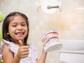 Little girl teeth are healthy in dental office, dental care