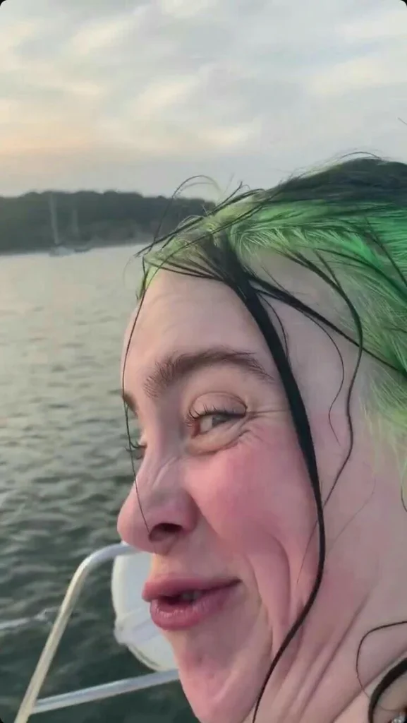 Distorted close-up images of Billie Eilish making bizarre facial expressions in three different weird, meme-like screenshots