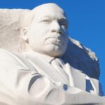 Statue of Martin Luther King Jr. Against Blue Sky