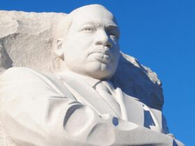 Statue of Martin Luther King Jr. Against Blue Sky