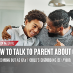 A parent and child having a heartfelt conversation outdoors