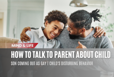 A parent and child having a heartfelt conversation outdoors