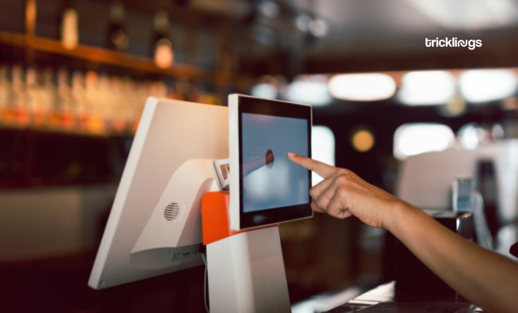 Women Hand doing process payment on touch screen cash register