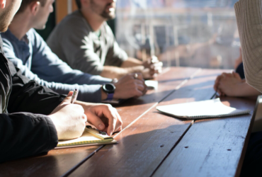 Business team discussing strategies to optimize talent for start-up success