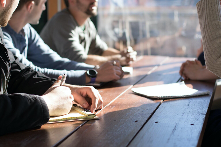 Business team discussing strategies to optimize talent for start-up success