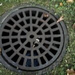 Sewer cover, Iron grate, Steel image.
