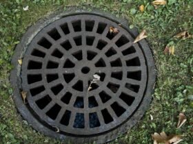 Sewer cover, Iron grate, Steel image.