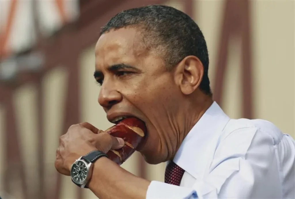 Strange and funny image of president Obama in formal attire taking a huge bite of a pretzel — weird funny pictures of public figures caught in candid moments.