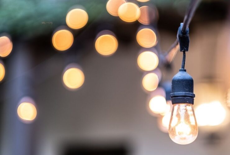 Hanging Outdoor Lights Over Patio With Copy Space
