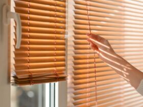 Woman Opening Blinds on Window