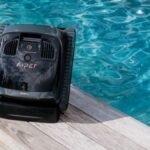 Aiper IrriSense Smart Sprinkler watering a garden lawn efficiently to reduce water waste.
