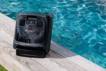 Aiper IrriSense Smart Sprinkler watering a garden lawn efficiently to reduce water waste.