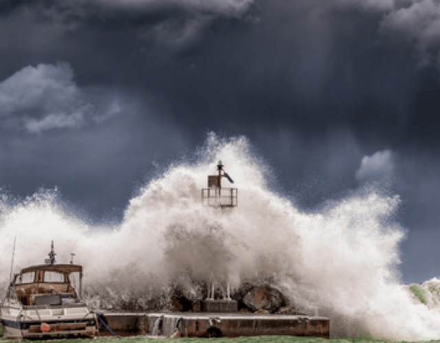 Big Waves Under Cloudy Sky showing Tsunami Warning California