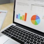 Laptop displaying data analytics for smarter business decisions
