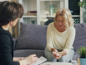 Two women talking during a mental health consultation session