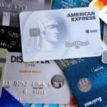 Stack of credit and debit cards representing debt consolidation