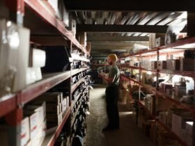 Man standing inside a warehouse representing emerging trends in business operations