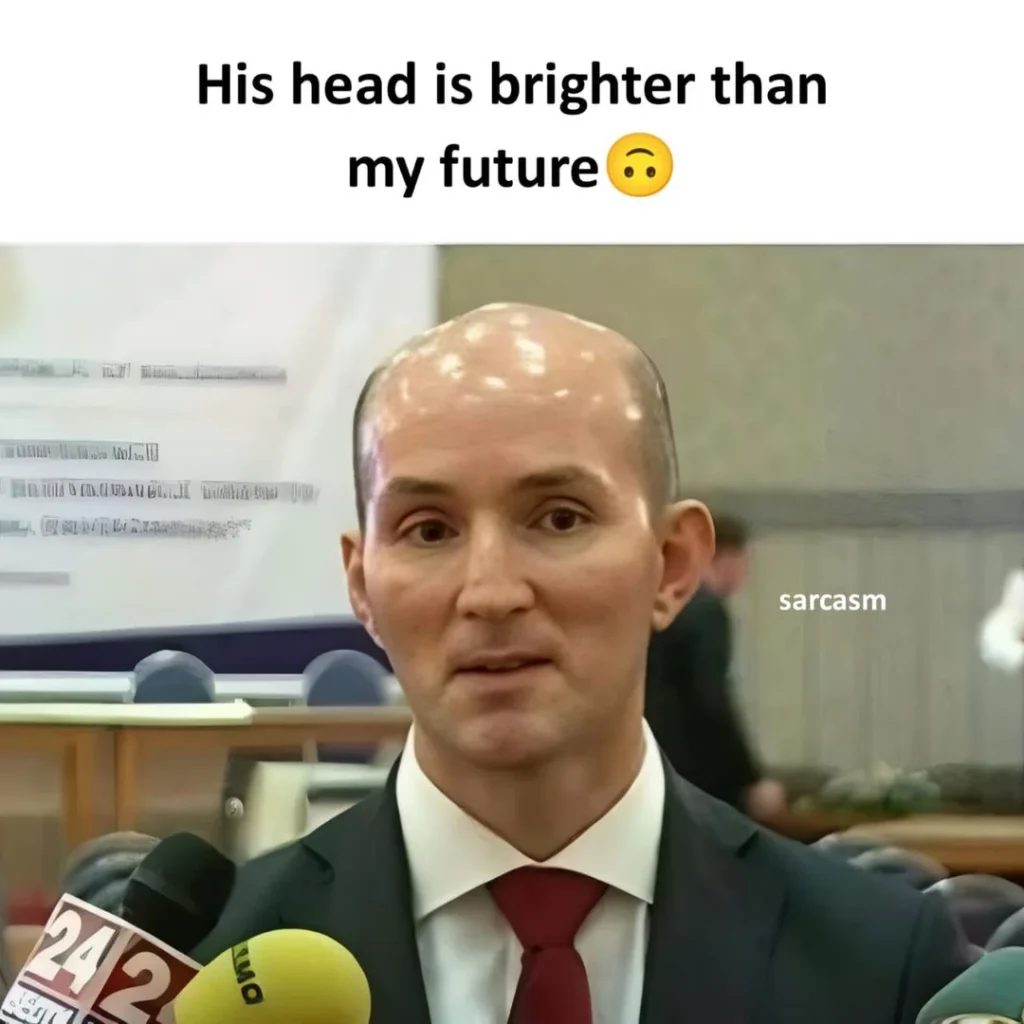funny meme of bald man with shiny head brighter than future caption