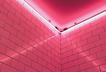 Hidden LED lighting in modern interior design with pink fixture