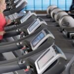 Senior man walking indoors for exercise to maintain health and independence