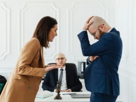Couple consulting a land dispute lawyer about property issues