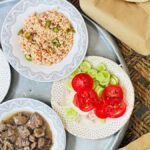 Traditional Middle Eastern meal with flatbreads on a rustic table