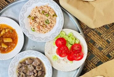 Traditional Middle Eastern meal with flatbreads on a rustic table