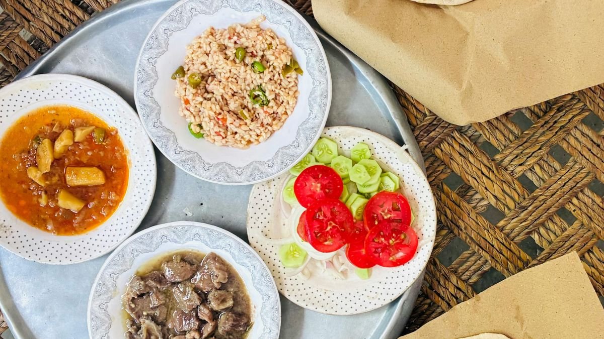 Traditional Middle Eastern meal with flatbreads on a rustic table