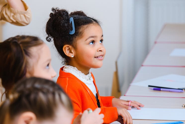 Children engaged in hands-on classroom learning activities
