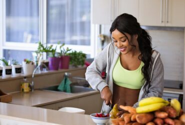 Woman preparing healthy food as part of a toxin-free lifestyle