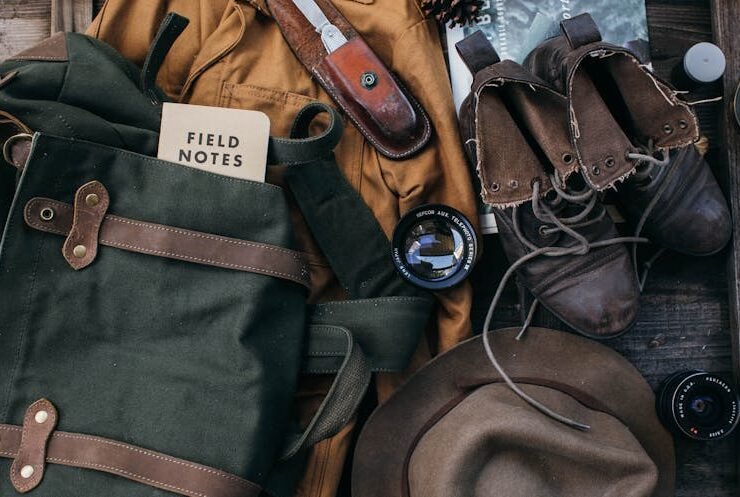 Laid-out travel clothes and gear ready for an adventure trip