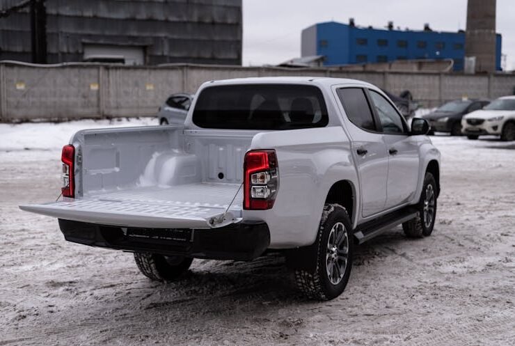 White SUV parked in snow with spacious cargo area