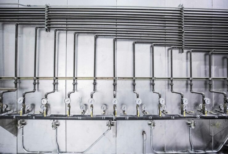 Steel pipe lines with pressure gauge used in plumbing systems